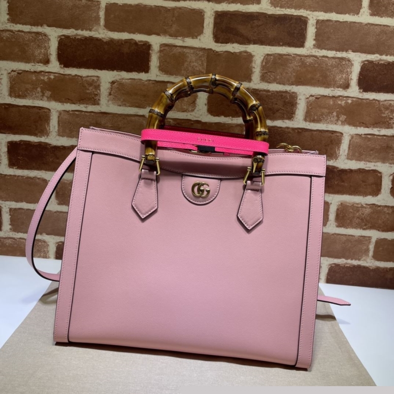 G*u*i top handle bags